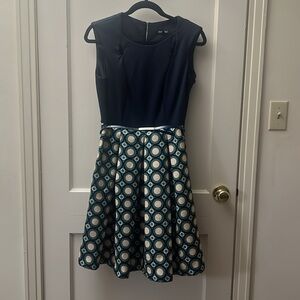 Elegant and simple Dress, used once and kept in the closet. Color dark blue